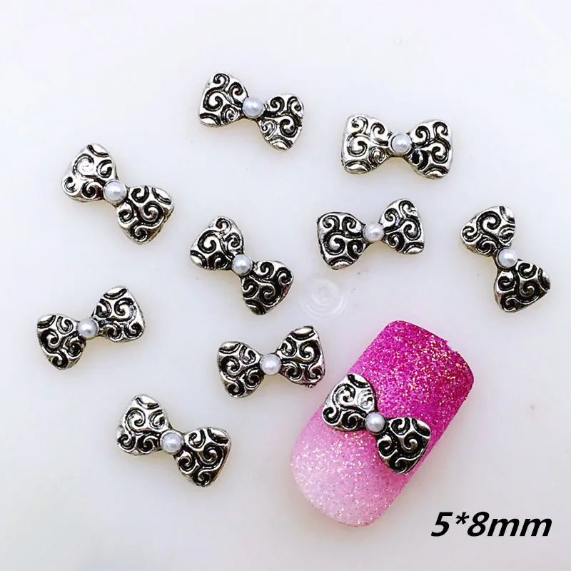 

20pcs/pack Japan Alloy Nail Art 3D Retro Silver Bow Knot with Pearl Metal Accessories for Phototherapy Nail Sticker DIY