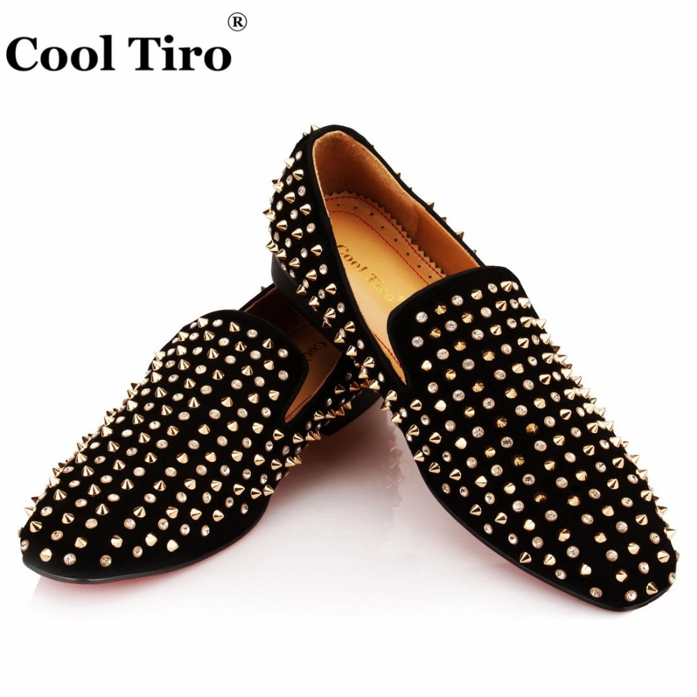 black loafers gold spikes