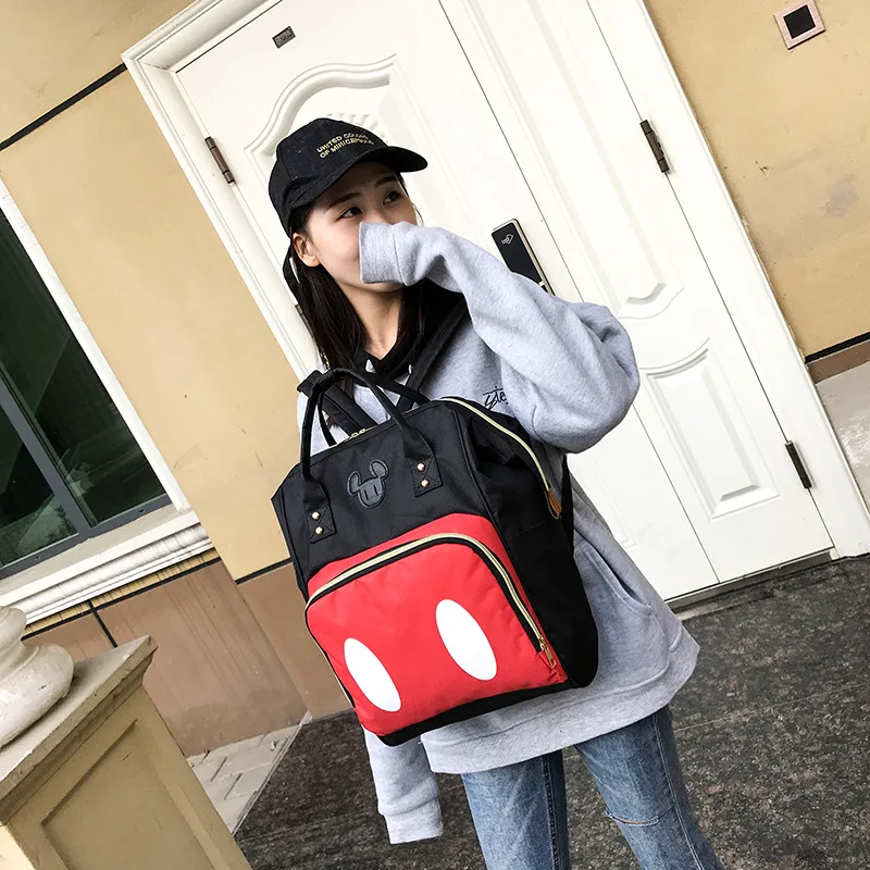 

2019 new Disney backpack Mickey mouse Minnie travel couple canvas shoulder bag large mother bag wear-resistant student bag