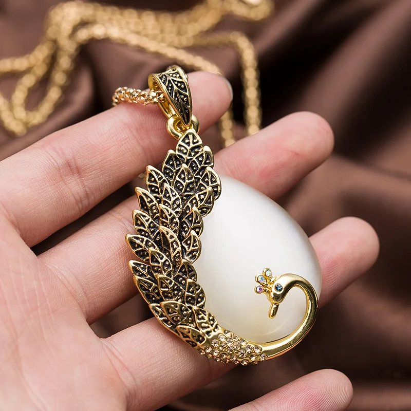 

Fashion Rhinestone Opal Crystal Peacock Pendant Leather Necklace Sweater Chain Jewelry