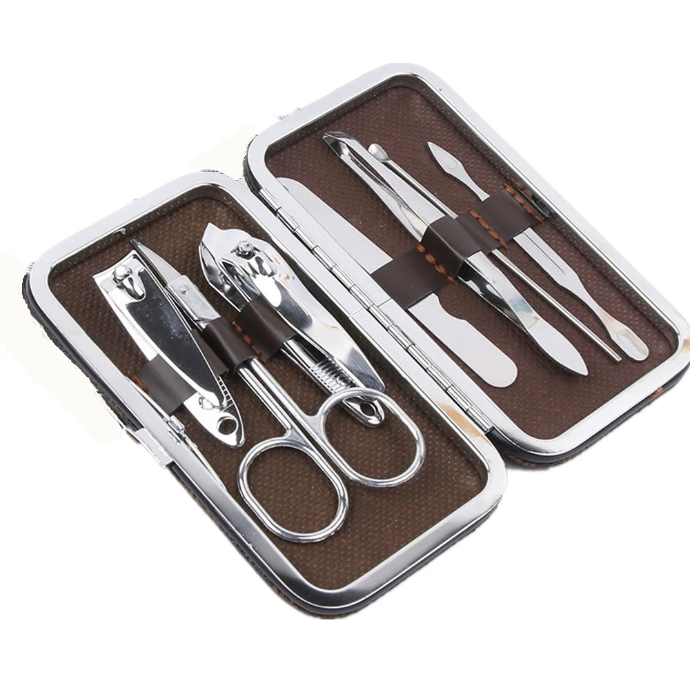 

7pcs/Set Nail Clipper Kit Nail Care Pedicure Scissor/Tweezer/Knife/Ear Pick,Utility Manicure Set Tools+Stone Pattern/grid Case