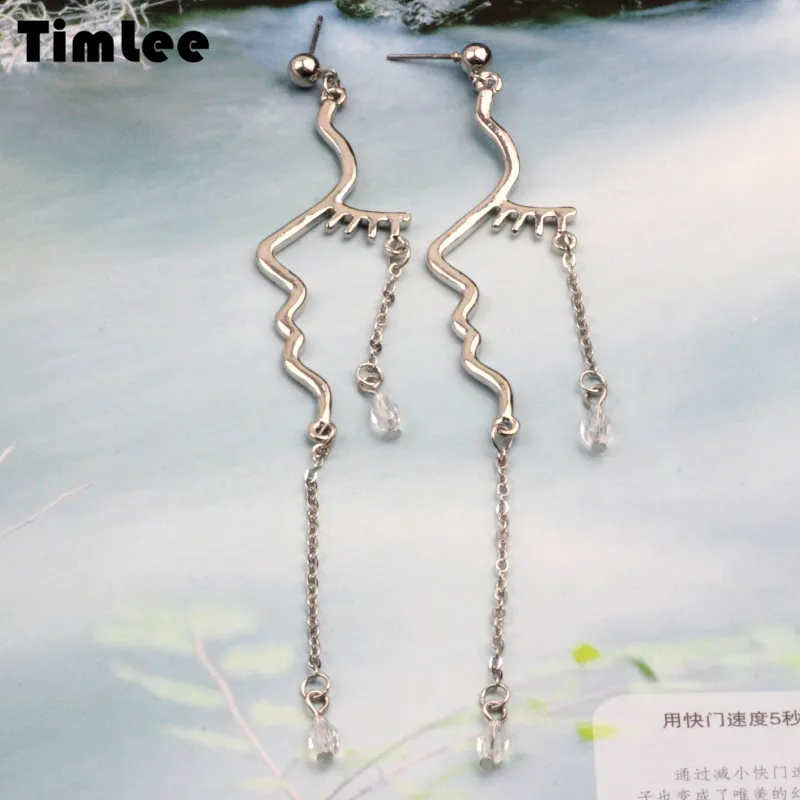 

Timlee E086 free shipping Personality Exaggeration Distortion Face Outline Chain Alloy Long Drop Earrings wholesale