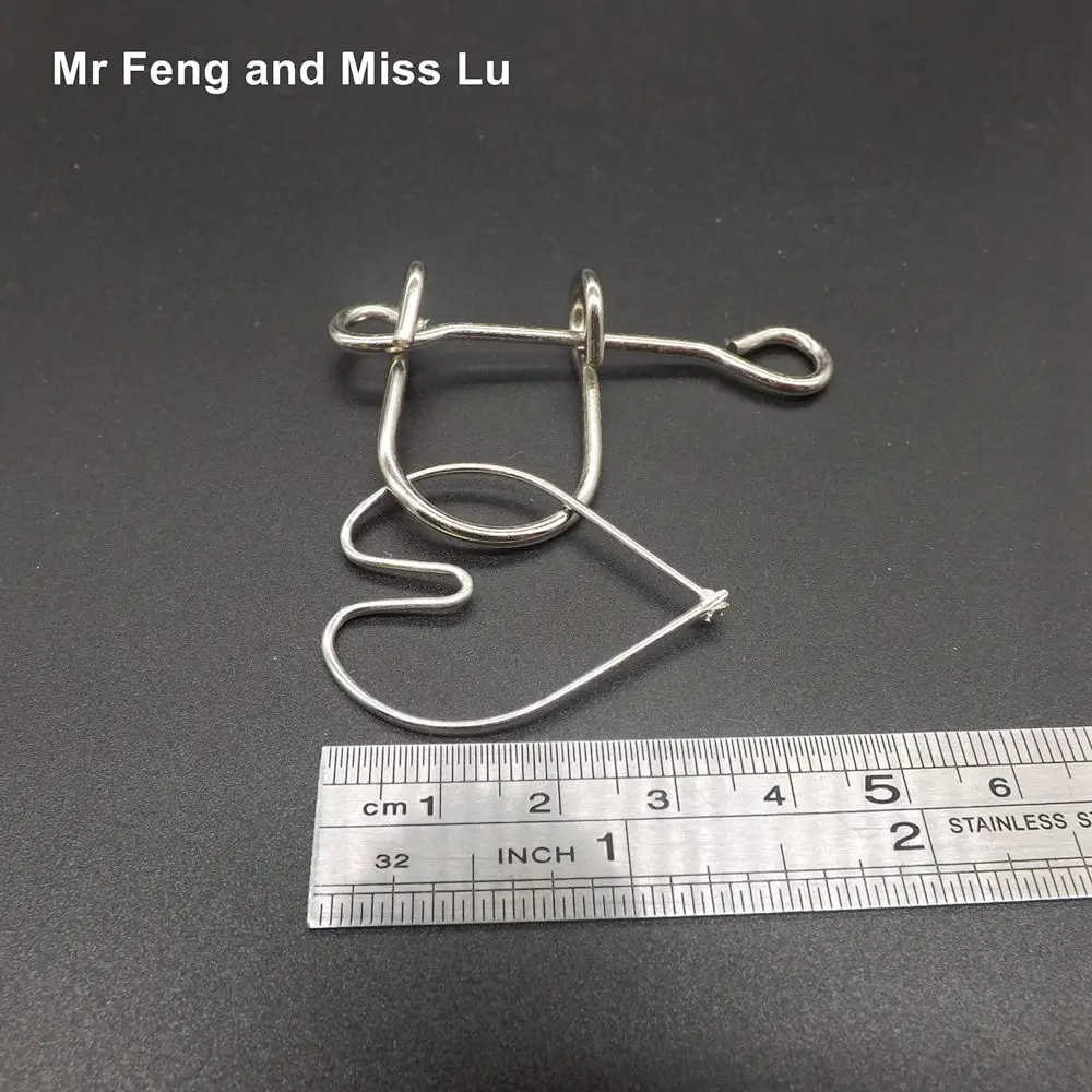 

Heart Mini Magic Trick Gadget Mind Game Toys Kid Brain Teaser Metal Wire Puzzle