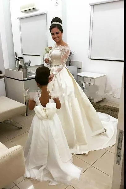ivory-a-line-wedding-dresses-lace-beaded-off-the-shoulder-sheer-long-sleeves-bridal-gowns-back-covered-buttons-satin-sweep-train-vestidos (3)__
