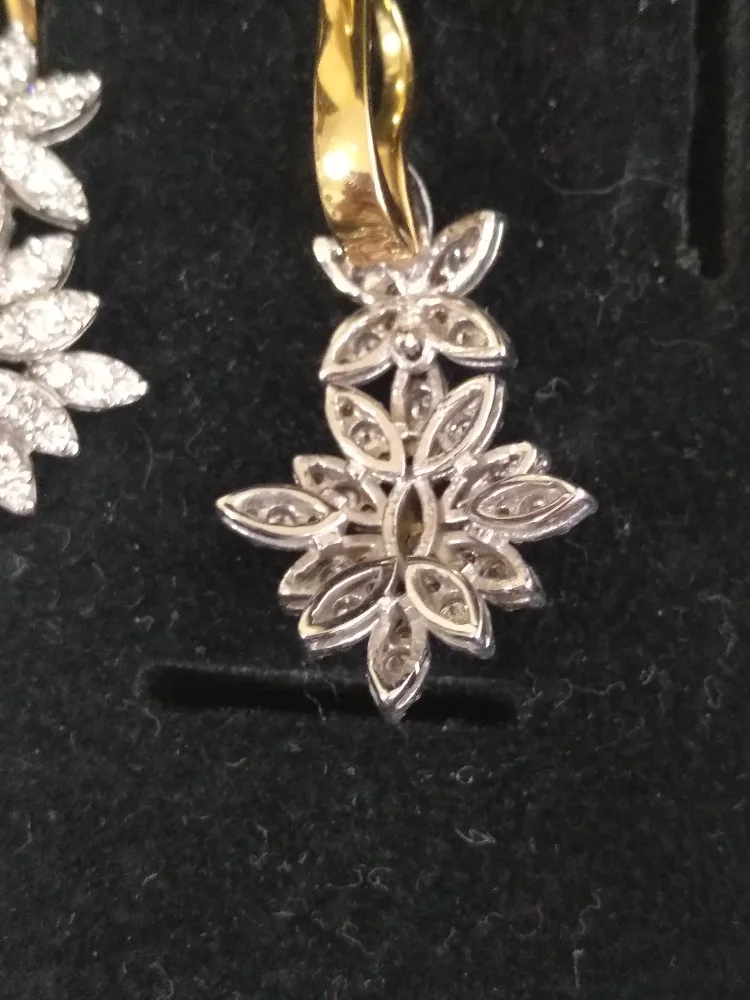 

Custom order 18K white gold and yellow gold moissanite ring.