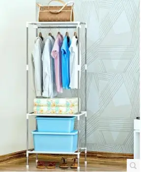 

Steel pipe rack hangs from the shelves of clothing store shelves