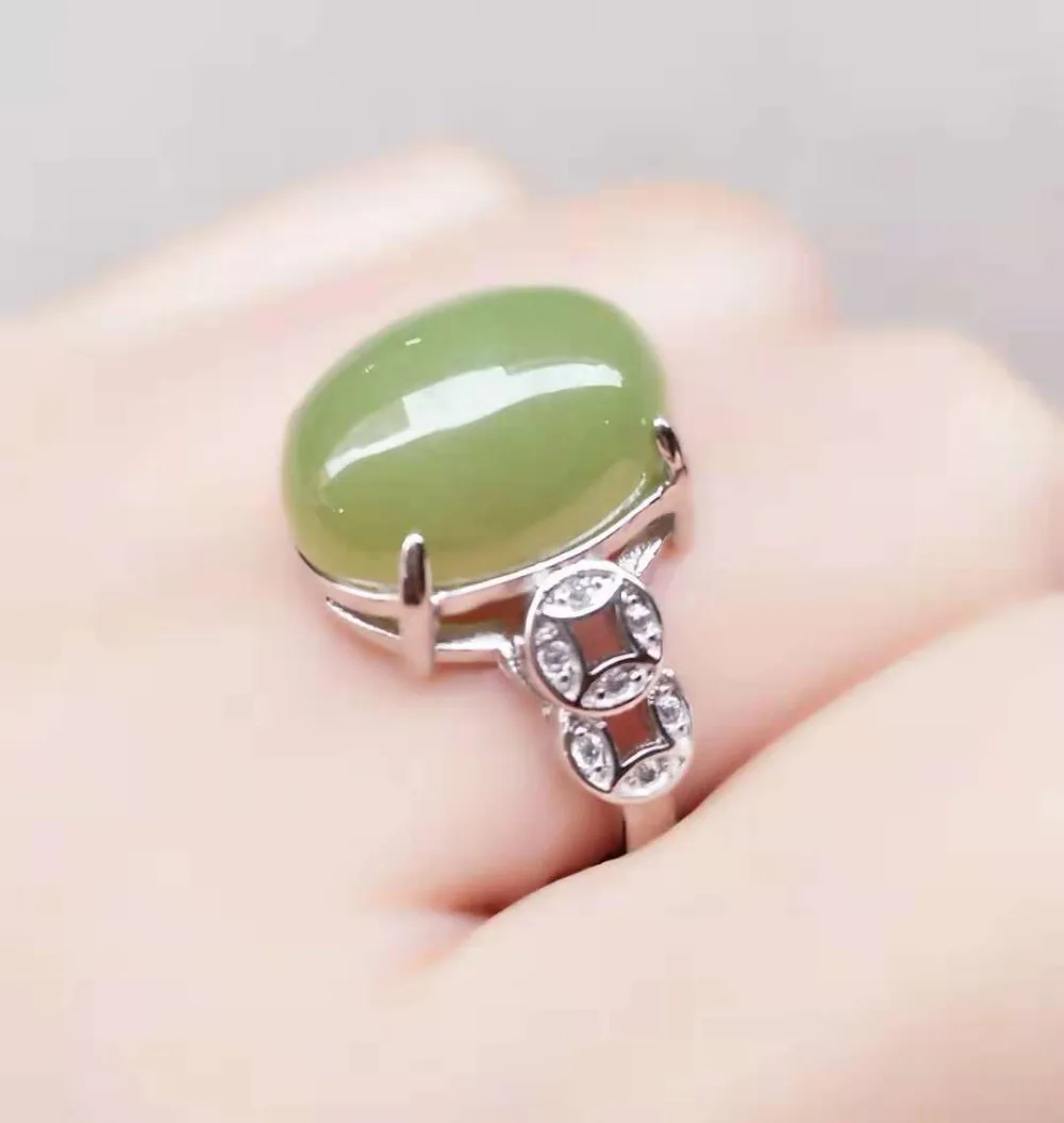 

Beautifully inlaid fluorescent stone, lady ring