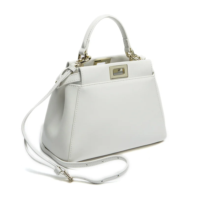 

2019 New Spring and Summer Korean Version of The Cowhide Female Bag Hand-held Reclining Lock Leather Lady Shoulder Bag