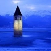 Lago Di Resia Church  Tyrol  Italy Poster Print (18 x 6)