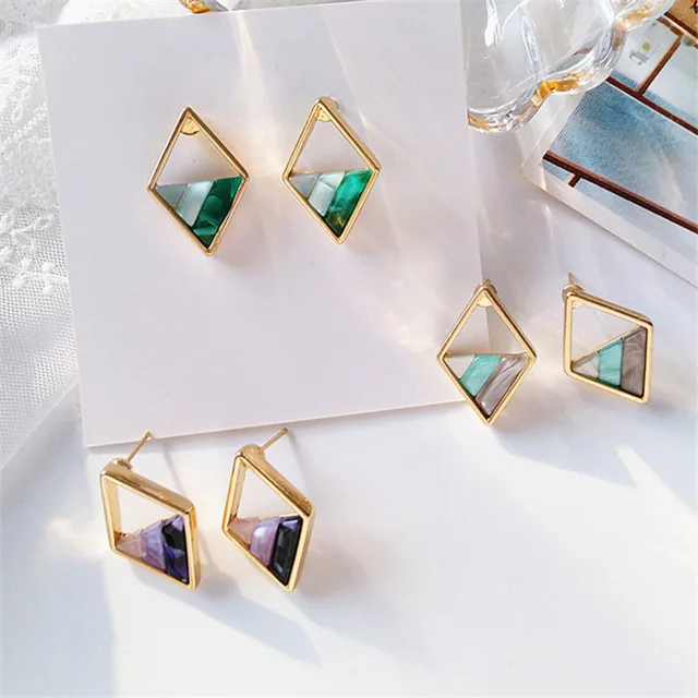 Contracted-lozenge-color-contrast-color-earrings-female-fashion-lady-geometric-hollow-out-the-triangle-stud-earrings.jpg_640x640
