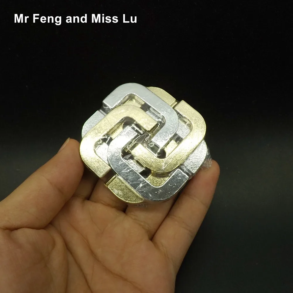 

Four Leaf Clover Lock Cast Metal Ring Puzzle 3D Recreational Mind Game Kid Toy