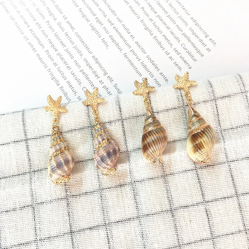 

Timlee E102,Free Shipping,New Temperamental Delicate Shell Starfish Metal Dangle Earrings,Popular Accessories Wholesale