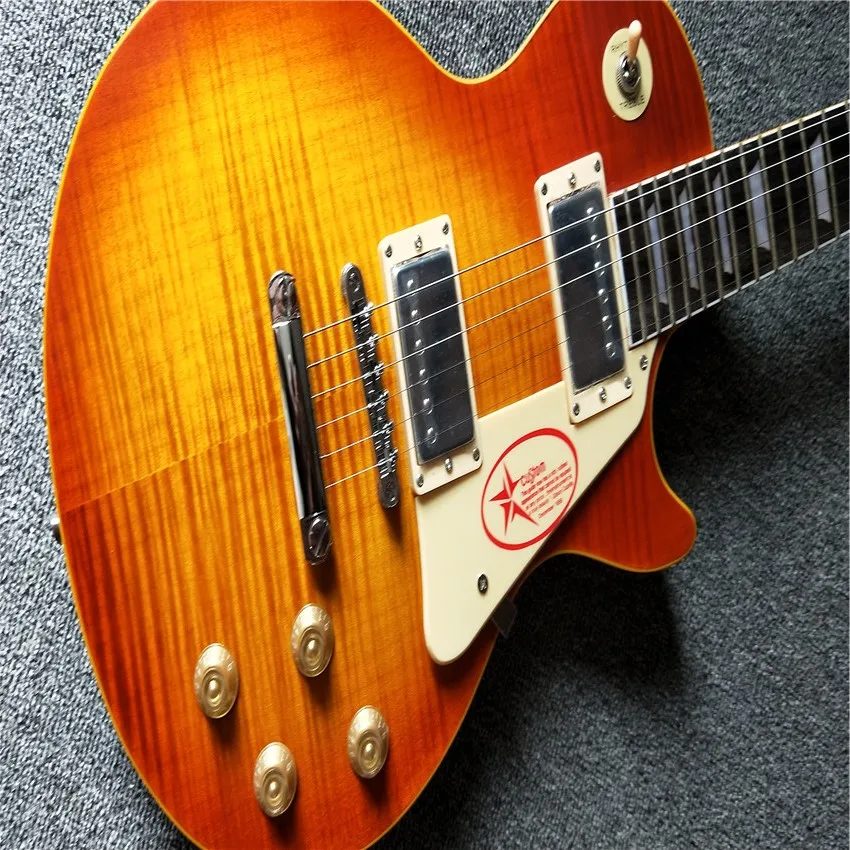 

Best-selling model 6 string, yellow tiger pattern electric guitar and solid mahogany body, color optional, free delivery