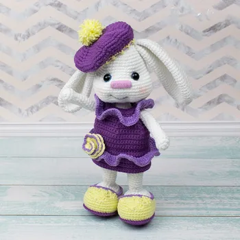 

Amigurumi Crochet bunny with floppy rattle toy and doll