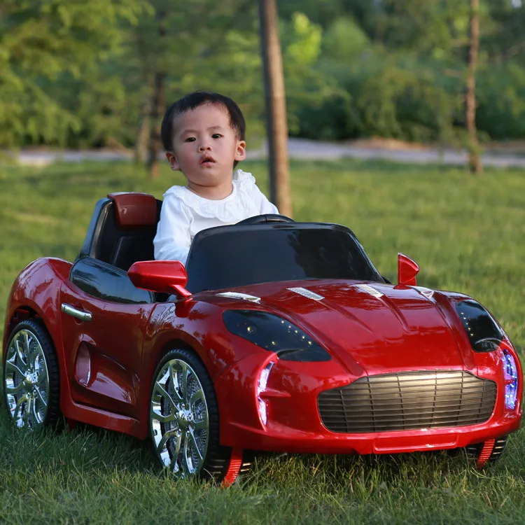 Four children electric car stroller baby can sit with a remote control toy car children electric