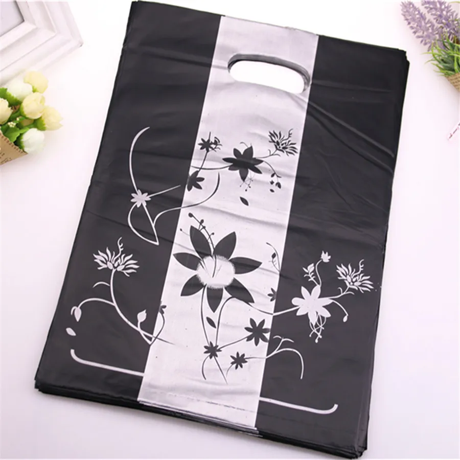 

New Design Wholesale 100pcs/lot 25*35cm Large Bolsas de Plastico Shopping Bags Black Luxury Casamento Gift Packaging Bags