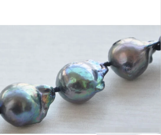 

A 17" 19mm black BAROQUE KESHI REBORN PEARL NECKLACE