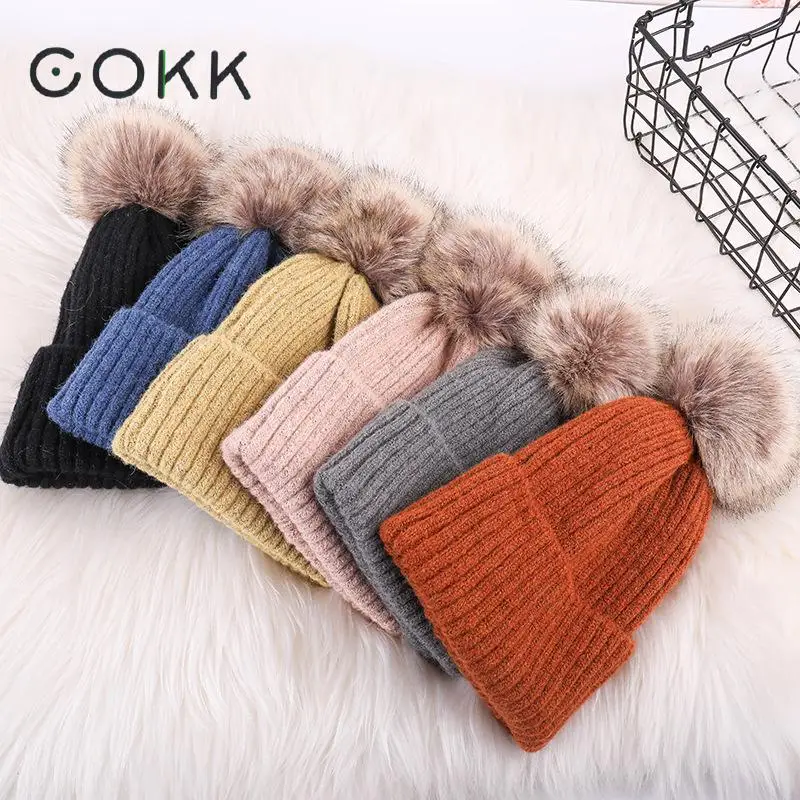 

COKK Winter Hats For Women Bonnet Thickened Warm Knitted Cap With Pompom Faux Fur Beanie Stretch Hat Female Pompons 2019 New
