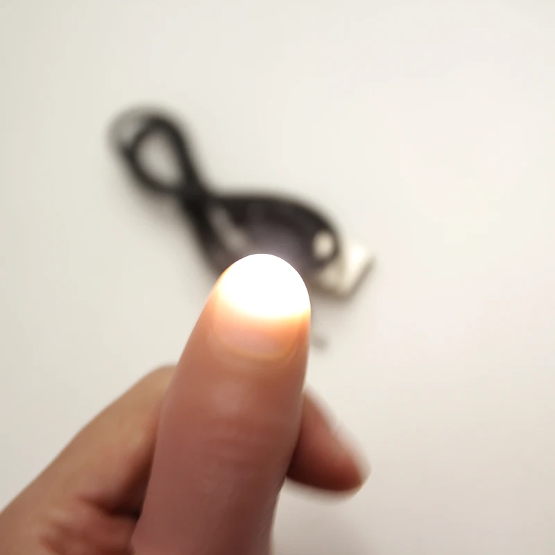 

1set Flash Thumb Tip stage Magic Tricks Lighting up thumb white Magic props Gimmick Professional Magician With USB Charger 82207