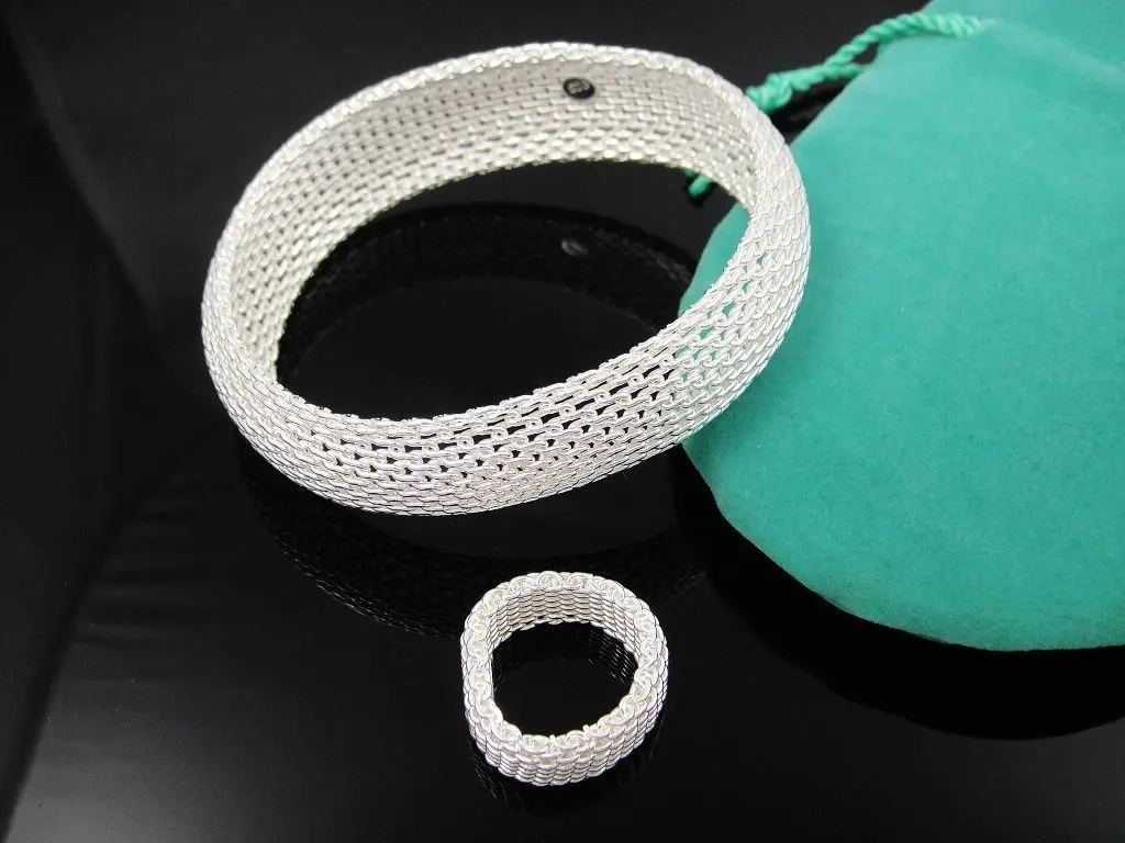 

Wholesale fashion jewelry Set, 925 Silver bracelets and ring . Nice Jewelry. Good Quality S173