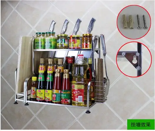 

The stainless steel kitchen is set up with a rack and a rack of kitchen utensils and tools