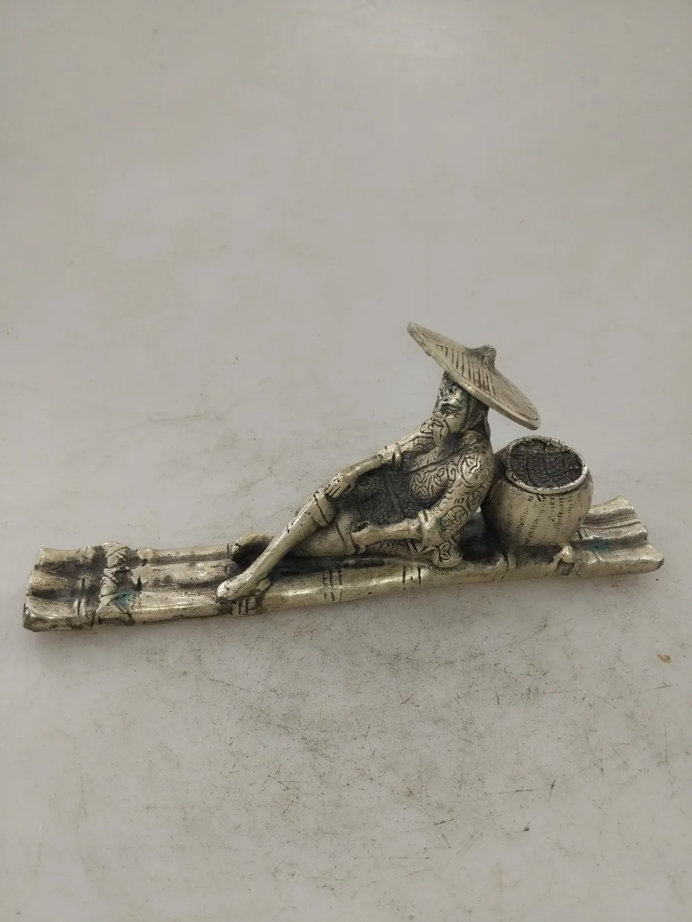 

Chinese hand carved white copper ancient fishing fisherman sculpture