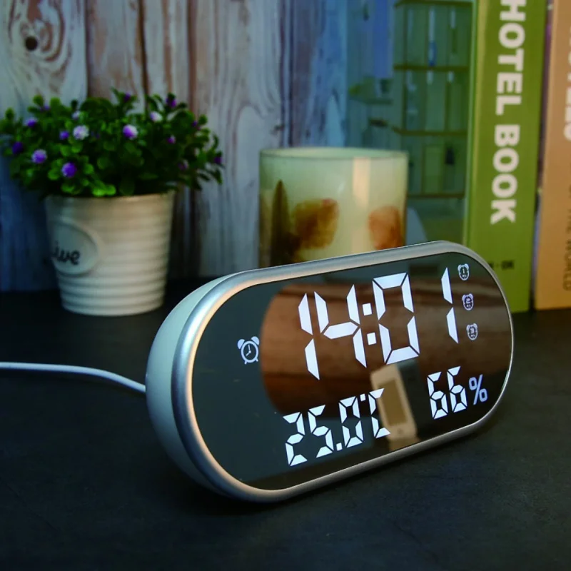 

Digital Alarm Clock Portable Mirror HD LED Display With Time/Humidity/Temperature/Display Function USB Phone Port Charging