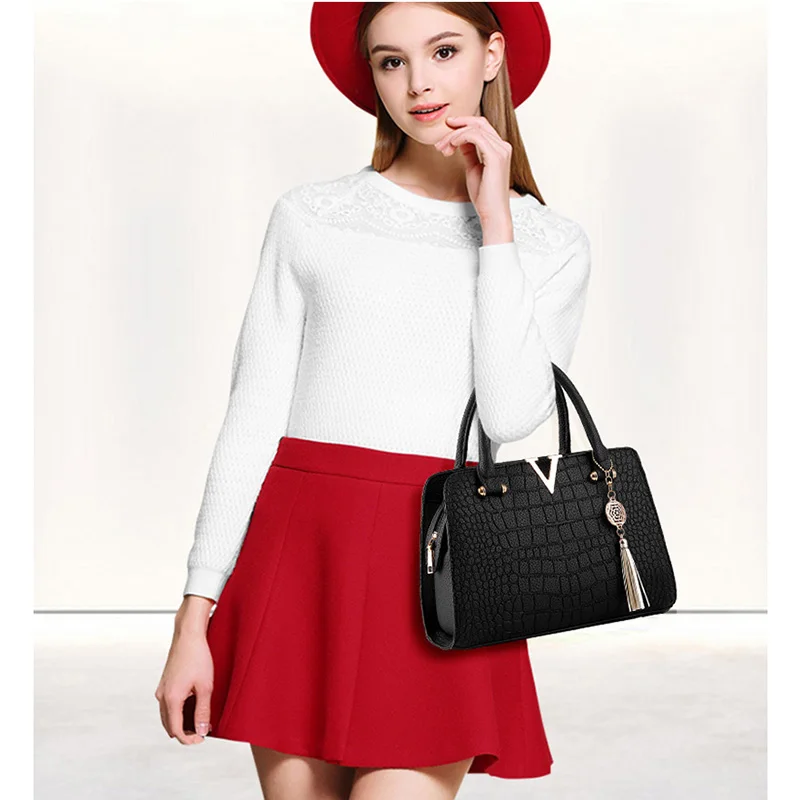 Nuevo patrón de cocodrilo bolso de las mujeres bolsos de mensajero bolsos de hombro Crossbody señoras borla mujeres bolsos de cuero caliente