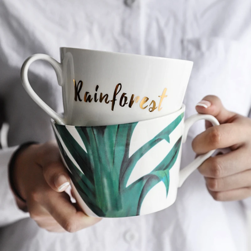 Baratos 1 unidad de diseño de hoja verde Taza de cerámica de estilo europeo taza jarra para agua de hueso fino de China taza de café taza de té