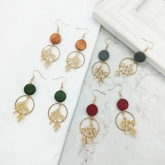 

Vintage Minimalist fashion design geometric round wood metal alloy leaves branches wild female charm feather earrings 2018