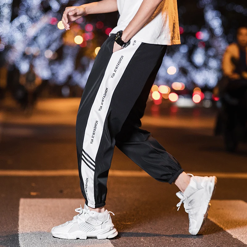 

YASUGUOJI New 2019 Fashion Streetwear Track Pants with Side Stripe Men Tactical Pants Men Reflective Joggers Pantalones Hip Hop