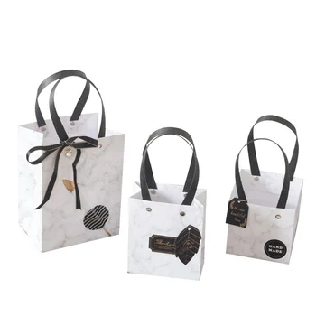 

Free shipping wholesale 60pcs/lot 10*10*10cm Marble Paper Jewelry Gift bag Gift Packaging Bag