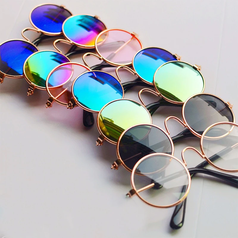 

Hot Sale Dog Cat Pet Glasses Little Cat Dog Eye-Wear Puppy Sunglasses Photos