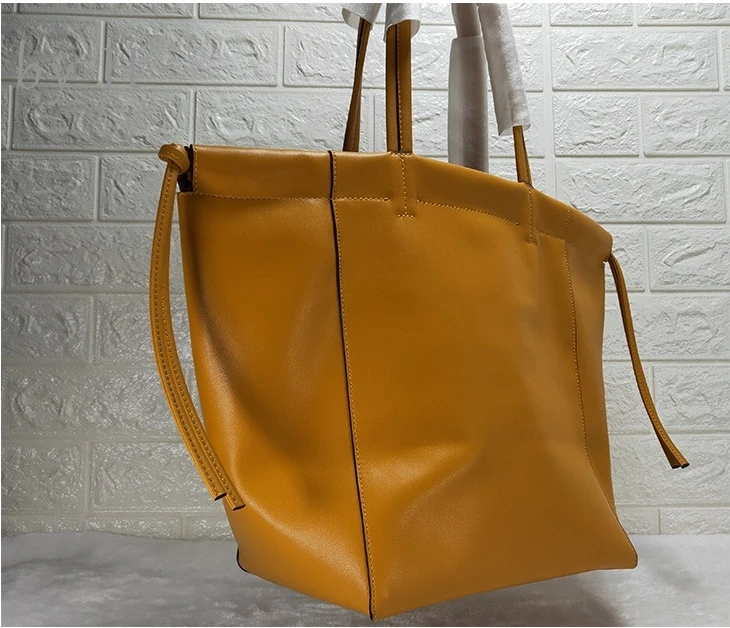 

by H 2019 new big capacity mami bag genuine leather fashion designer tote bag women's holiday vibes travel bag top handle gymbag