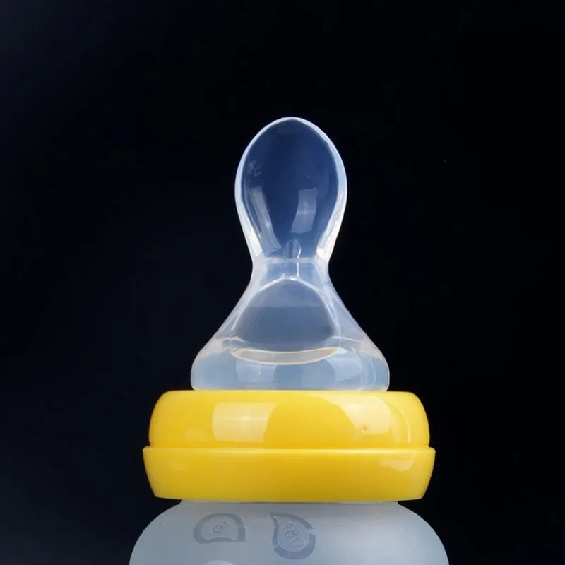 

Cute Wide Mouth Silicon Nipple Rice Cereal Feeding Bottle Transparent Spoon