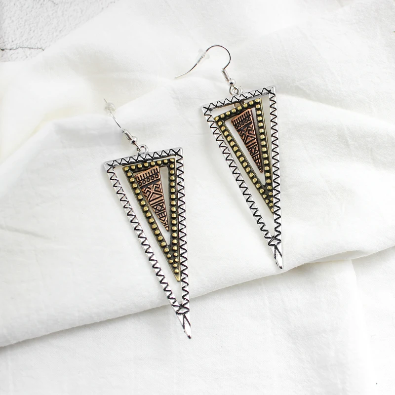 

Exaggerated Triangle Pendant Earrings Retro Totem Wavy Hollow Geometric Earrings Ethnic Style Female Personality Jewelry