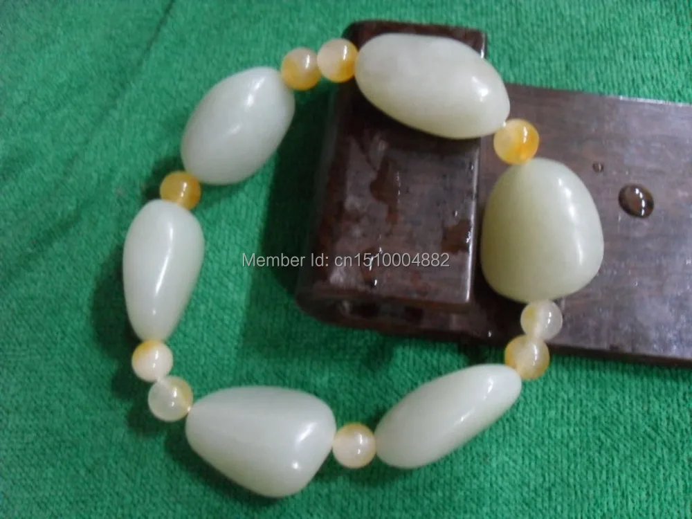 

shitou 00231 China Xinjiang and Tian bluish white jade elliptic Jade Bracelet