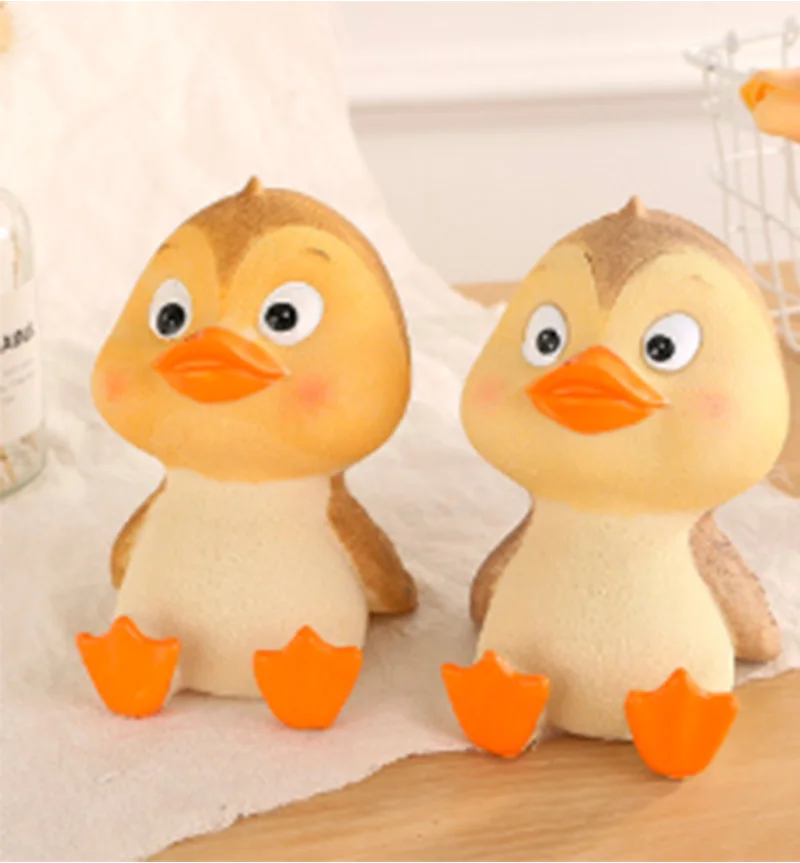 

Creative Resin Crafts Cute duckling piggy bank children's gifts can be accessed change tank