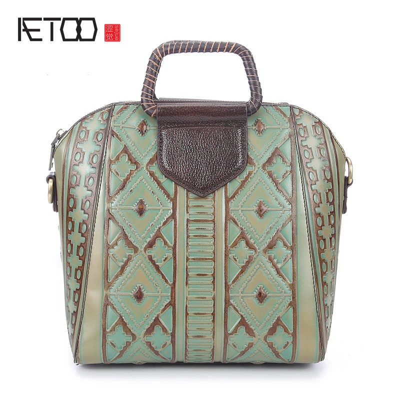 

EUMOAN New embossed wipe flowers leather temperament handbags fashion high-grade postman bag casual shoulder bag