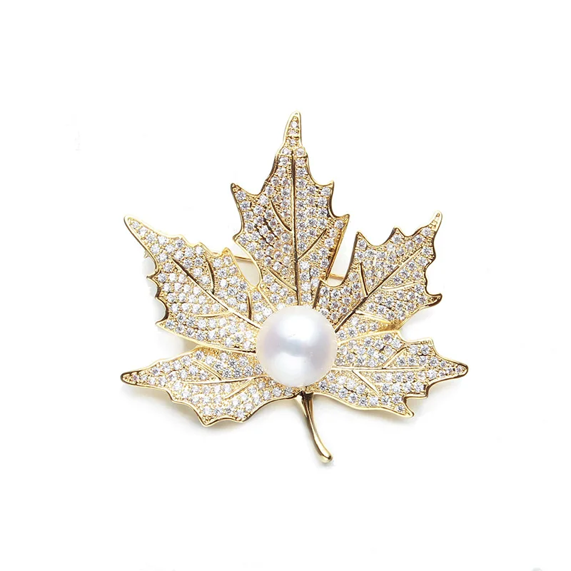 

Korean version of the fashion pearl leaves swan brooch pin South Korea crystal corsage women sweater accessories scarf deduction