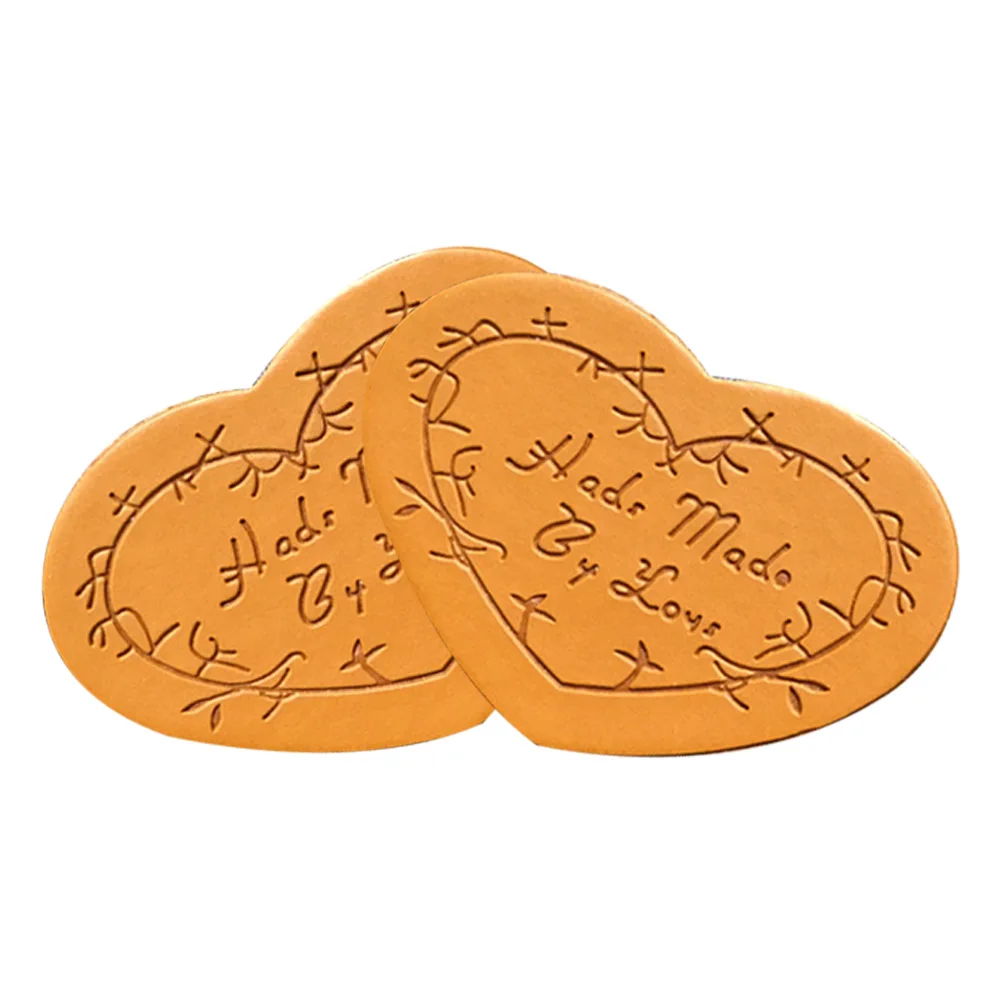 

48pcs/ lot Heart hand made by lovehand made leather zaka lebels for clothing sewing handmade gift label for family gift tags