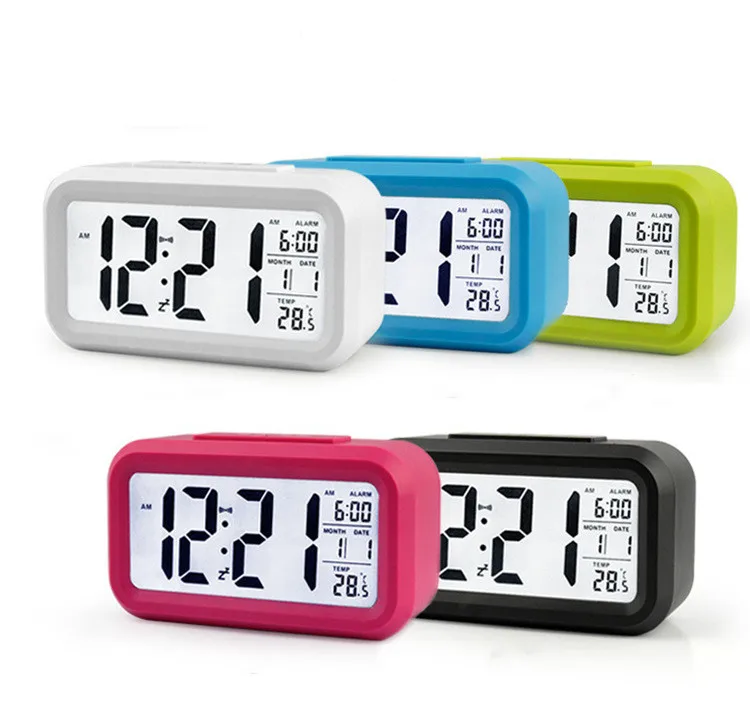 

Electronic Digital Alarm Clock LCD Display Snooze Temperature Backlight Sensor Night Light Student Clock Table Clock