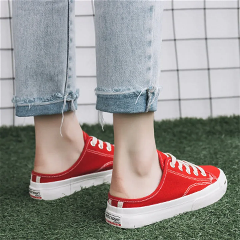 

White shoes female 2018 new non-heeled canvas shoes female wild pedal flat bottom half lazy shoes ladies vulcanized shoes