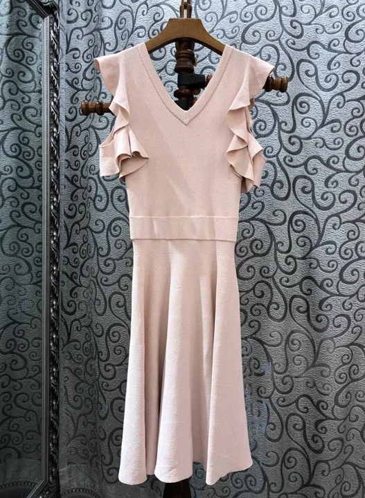 

Summer 2019 new V-neck irregular wooden ear edge stitching cuffs lotus leaf edge pure color dress 520