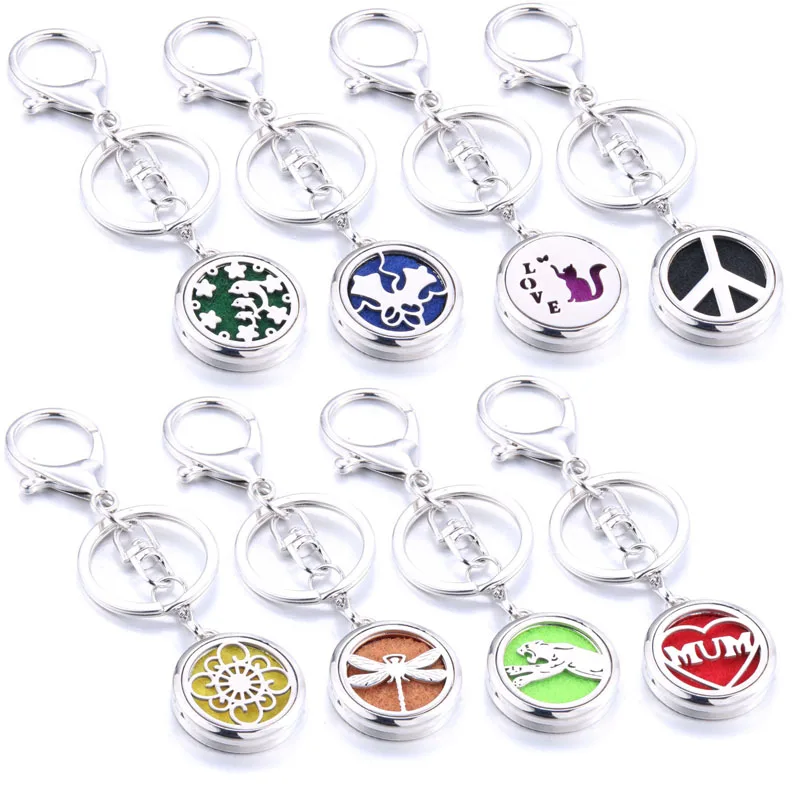 

New Aromatherapy Keychain Jewelry Dolphin cat Hollow Aromatherapy Perfume Locket Keychain Hook Floating Locket Key Chain