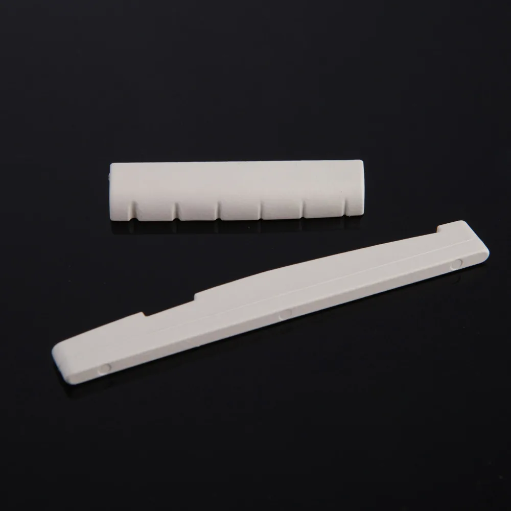 

A saddle And A Nut In One Set Guitar Bridge Bone Saddle Nut Set For Fender stratocaster Classical Guitar Musical Instrument