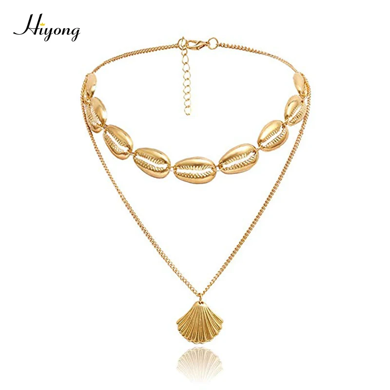 

HIYONG Bohemian Gold Shell Necklace Choker Cowrie Hawaiian Beach Sea Shell Tassel Double Layer Shell Gold Chain For Women Gift