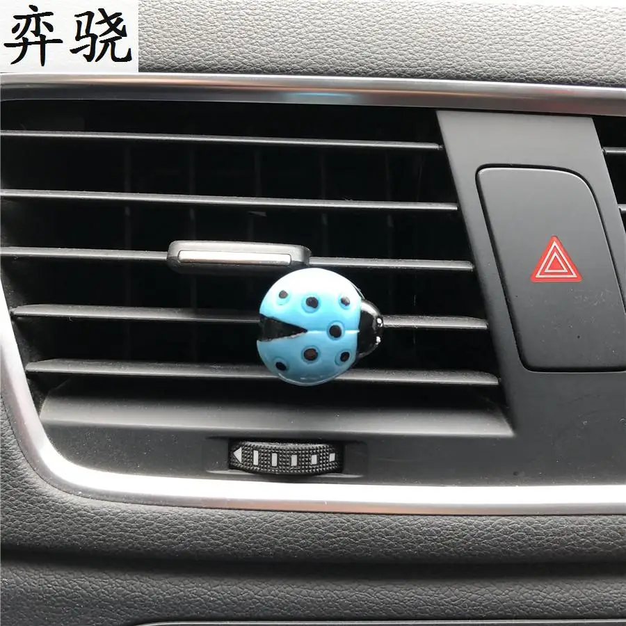 

Car Air Conditioning Outlet Perfume Beetle Car Air Freshener Perfume Automotive Interior Ladybug Styling Perfumes 100 Originais