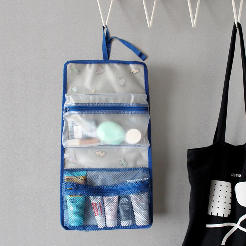 

Freelove PVC Hanging Tri-fold Wash Storage Pouch Package, Buckle for Closure and Hang Home Bathroom Air Travel Outdoor Organizer