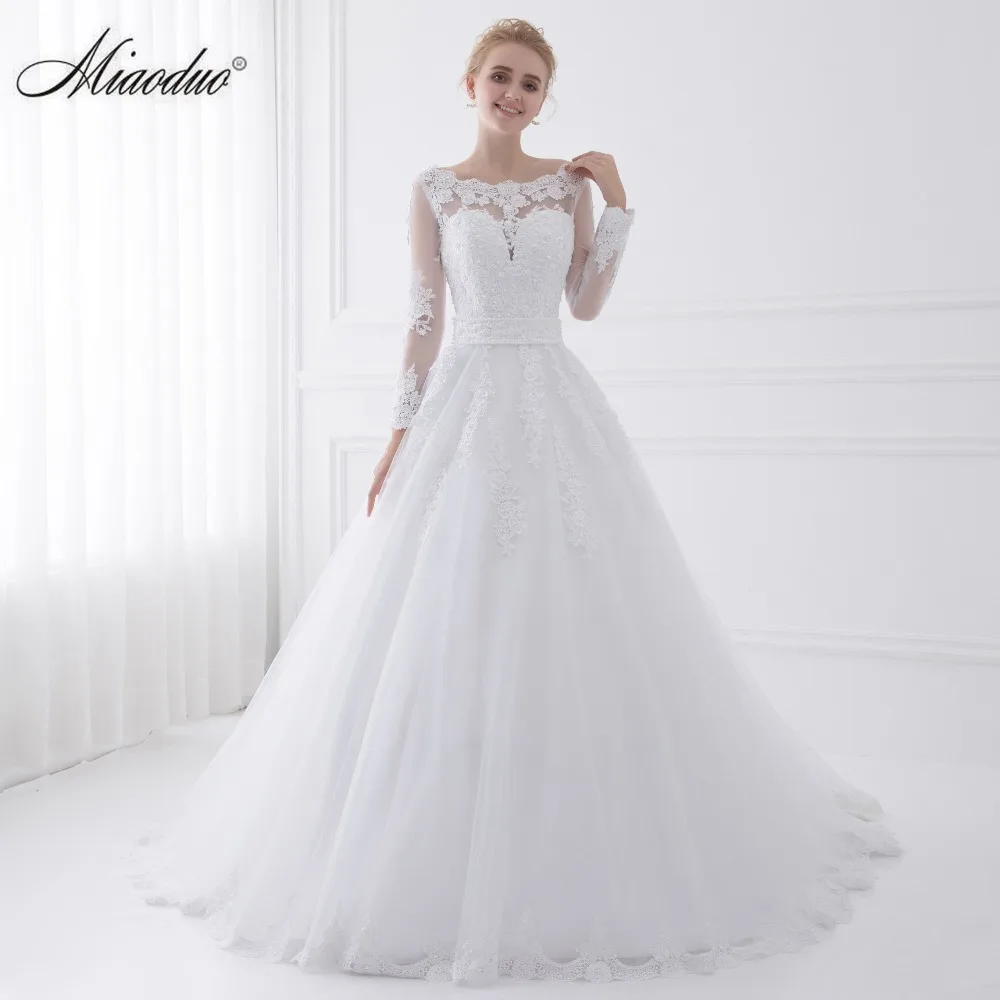 Новое поступление Vestido De Noiva 2018 с длинным рукавом Свадебные платья Прозрачная Тюль сзади пикантные Свадебные Платья для женщин Свадебные платья Жемчуг принцессы Новое поступление Vestido De Noiva 2018 с длинным рукавом Свадебные платья Прозрачная Тюль сзади пикантные Свадебные Платья для женщин Свадебные платья Жемчуг принцессы